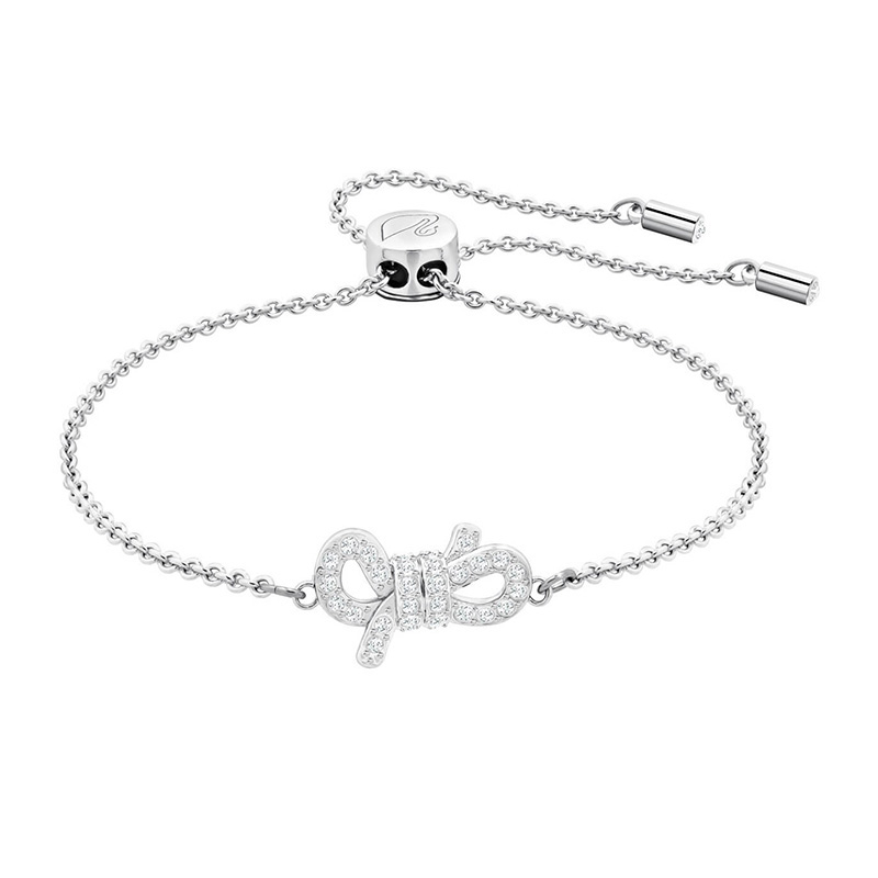 NEW SWAROVSKI LIFELONG BOW BRACELET 5469983 PLATED BRASS SILVER