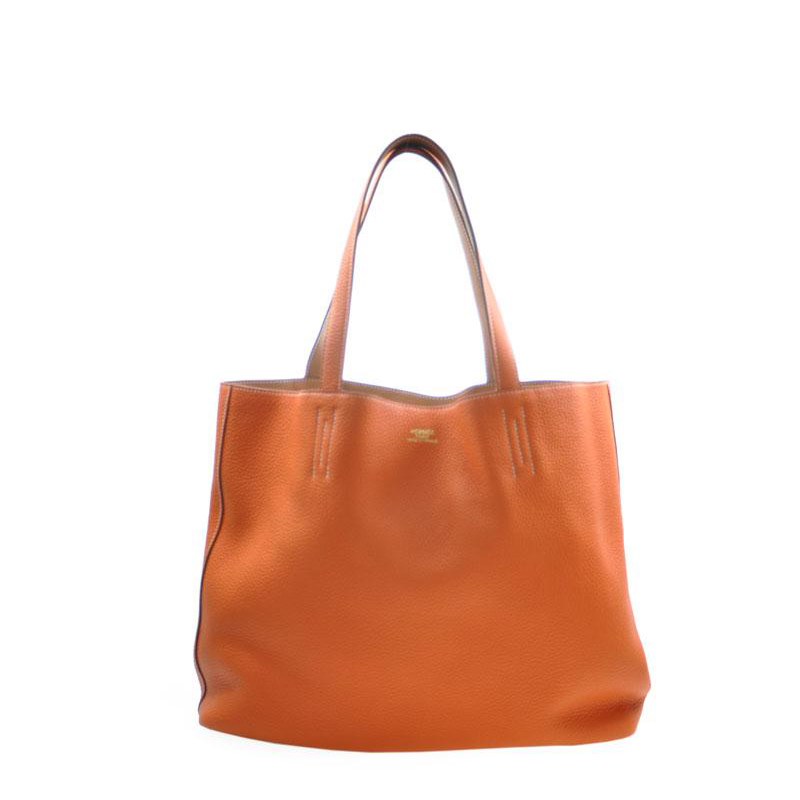 NEW HERMES HANDBAGS DOUBLE SENS 93/37 SHOULDER BAG ORANGE/GOLD Celebrity  standing