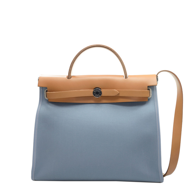 NEW HERMES BAGS HERBAG J7/37 SHOULDER BAG/CROSSBODY BAG /HANDBAG BLEU LIN  /GOLD Celebrity standing